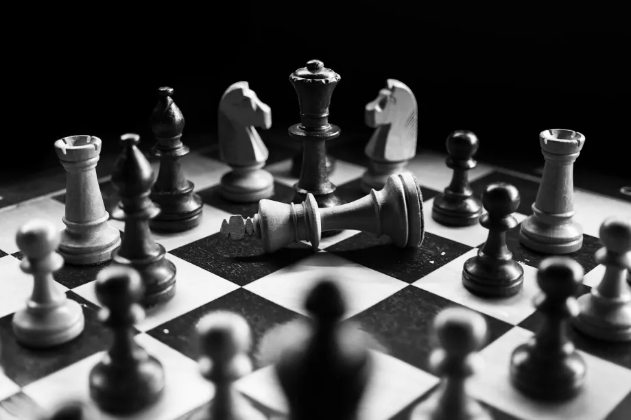 Chess pieces standing on a chessboard